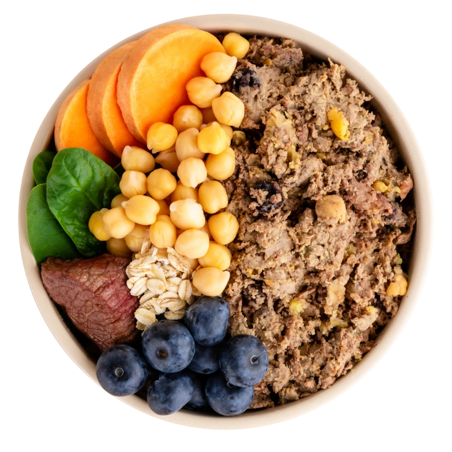 A bowl of DASH Beef Recipe surrounded by its whole-food ingredients