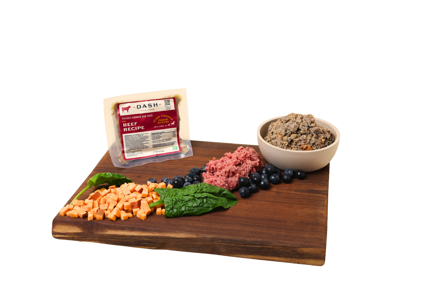 A wooden board with DASH ingredients — ten years of meat-sourcing rigour, now for your dog
