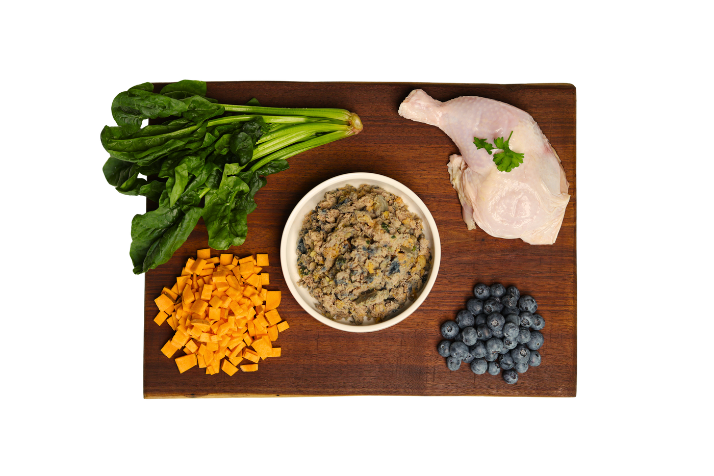 A board of whole-food DASH ingredients — chicken, blueberries, sweet potato, spinach — laid out for label-reading scrutiny